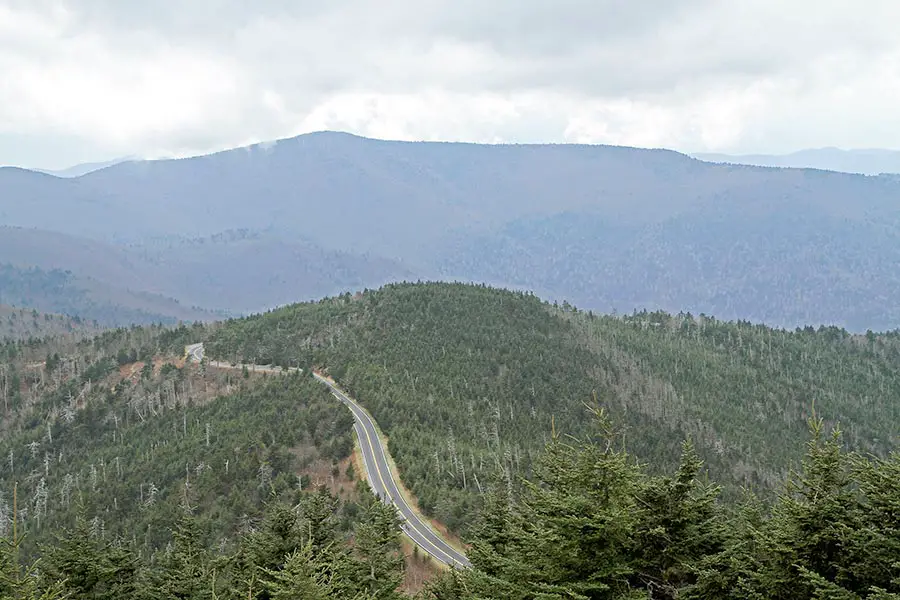 Winding highway over forested mountain in North Carolina