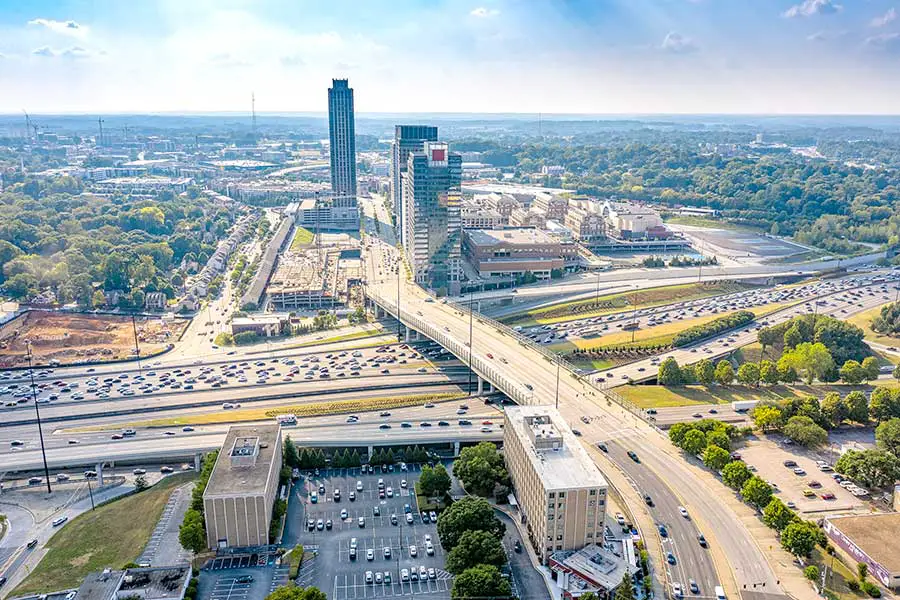 Aerial view of downtown Atlanta and crowded traffic on highway