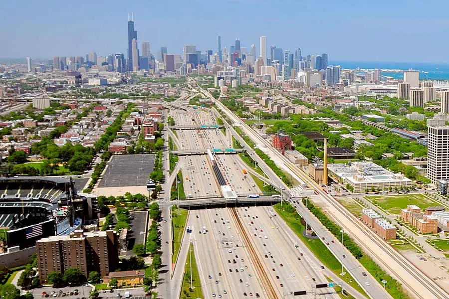 Aerial view of traffic heading into Chicago, Illinois, skyscrapers on the horizon
