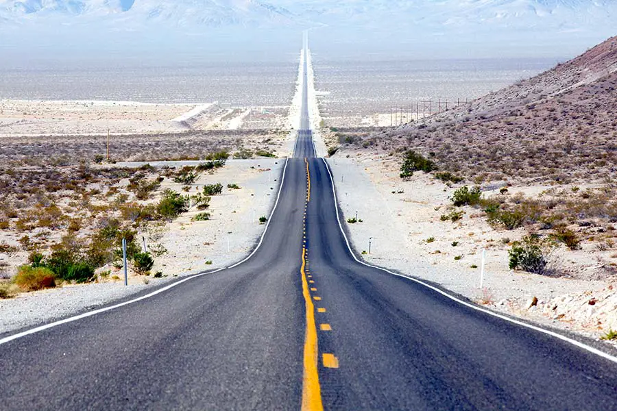 Long straight road through Death Valley, California