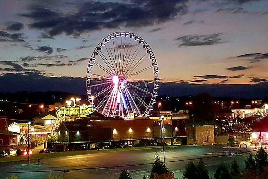 The Great Smoky Mountain Wheel illuminated at dusk