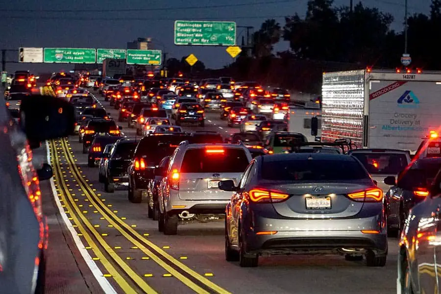 Night time bumper to bumper traffic on busy freeway