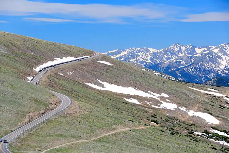 Trail Ridge Road is a high alpine mountain road that traverses over steep mountains